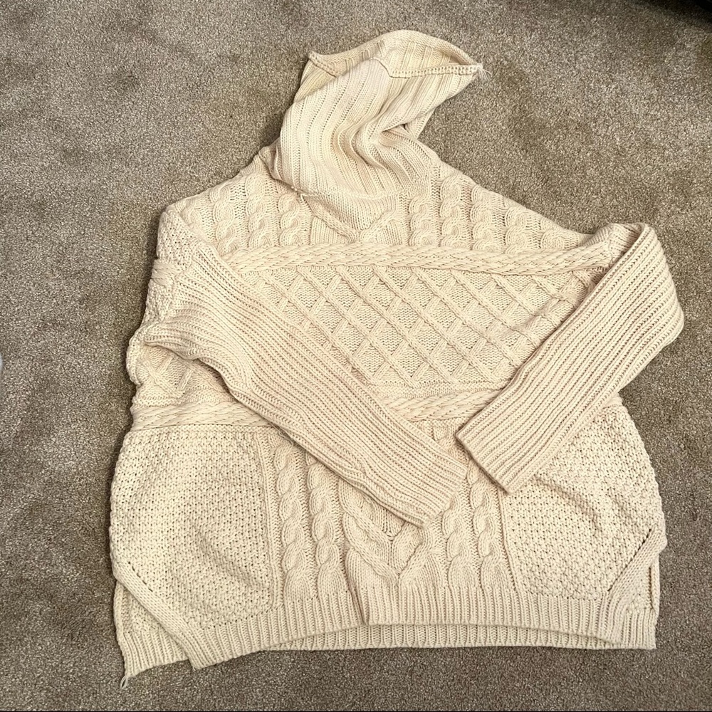 Oversized cream sweater with big turtle neck